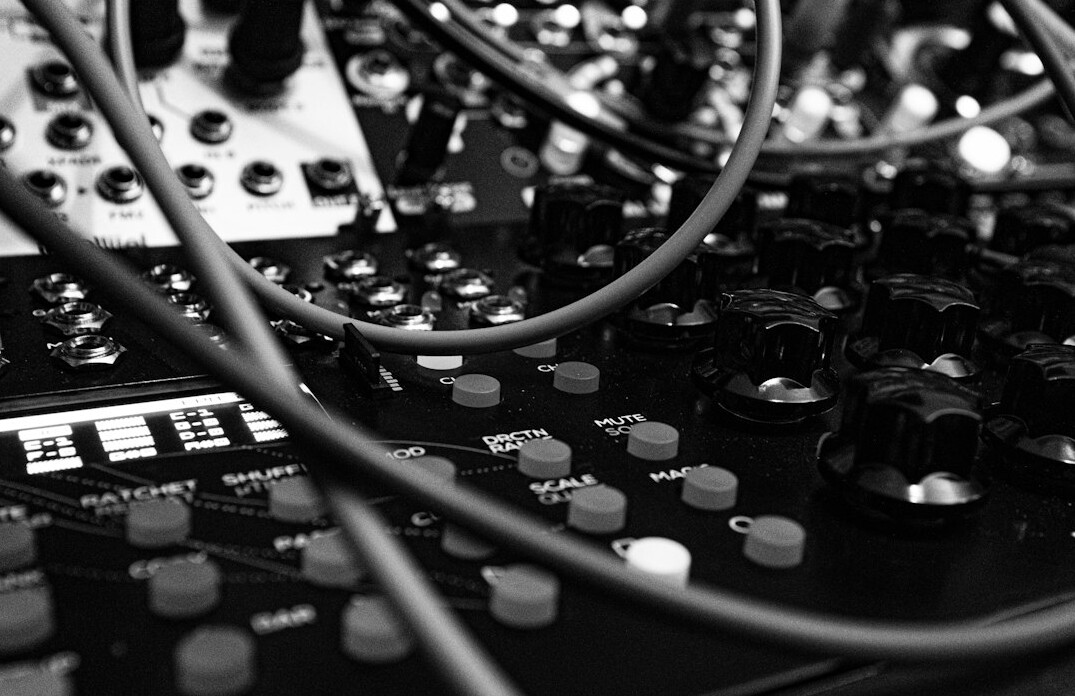 Audio mixing console and cable patch bay close-up