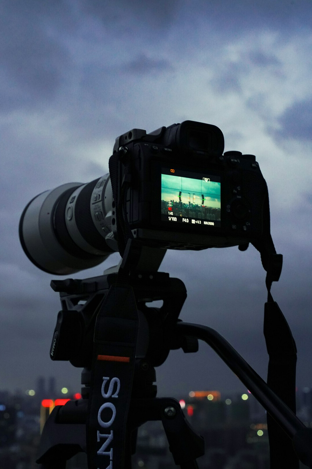 Professional broadcast camera on a tripod set up in a studio