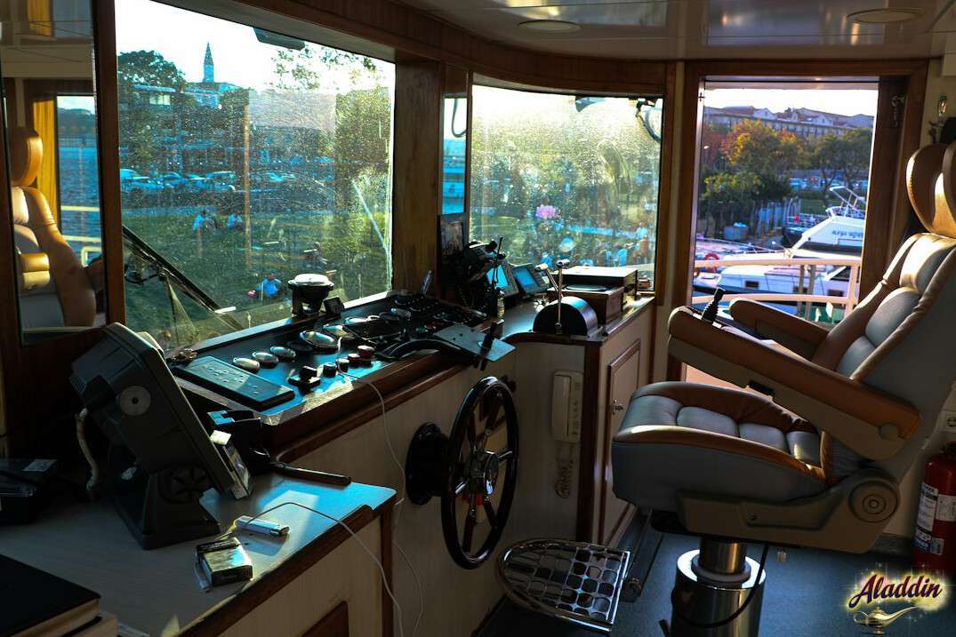Broadcast control room with engineers monitoring live feed screens